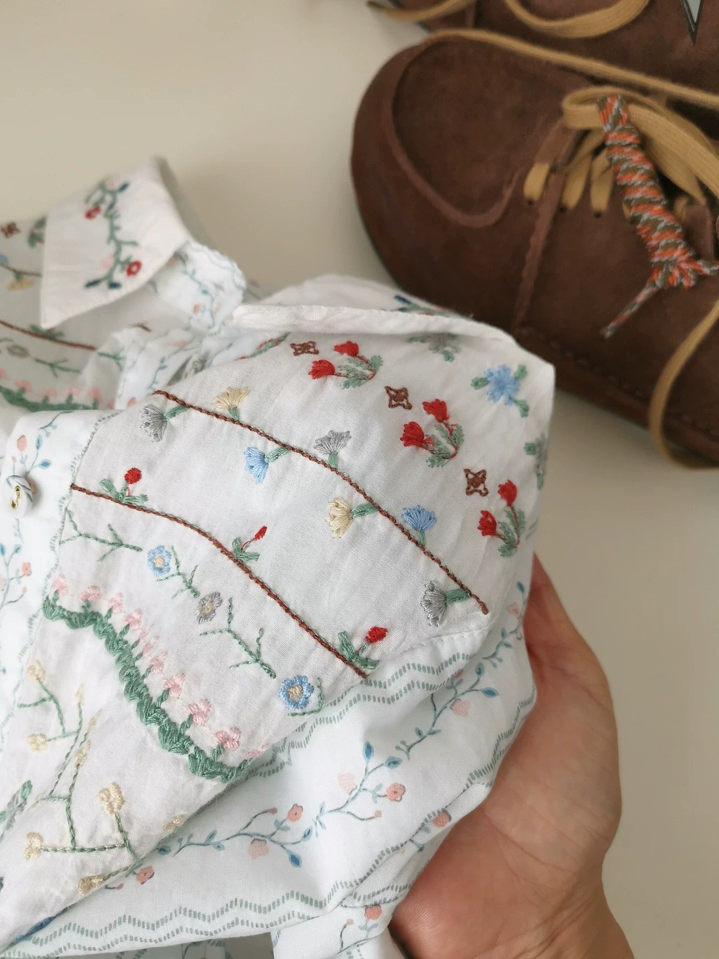 White embroidered floral shirt